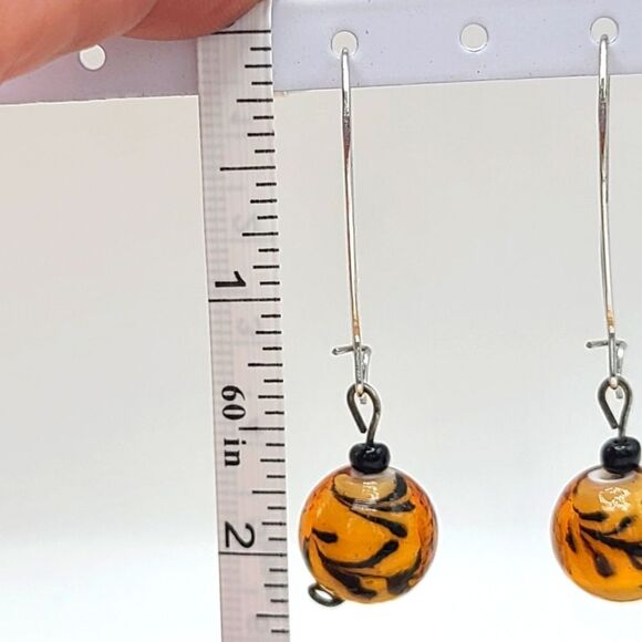 Blown glass earrings, orange and black, silvertone. - Picture 2 of 4